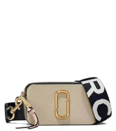 "Marc Jacobs Khaki Multi Snapshot Small Crossbody Bag for women, featuring a chic khaki color with playful multi-color accents. The bag includes an adjustable strap and a compact design, making it a stylish and versatile accessory for everyday use.