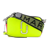 Marc Jacobs Neon Green Fluorescent Small Crossbody Bag for women, featuring a vibrant neon green color with a compact design. The bag includes an adjustable strap and a stylish silhouette, making it a bold accessory for any outfit."