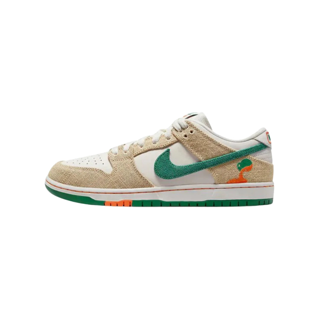 Nike SB Dunk Low "Jarritos" sneakers featuring a colorful design inspired by the popular Mexican soda. The shoe showcases a bright green suede upper with vibrant orange and yellow accents, along with playful graphics and unique branding. Displayed against a neutral background to emphasize the shoe's eye-catching aesthetic and festive theme.