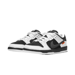 Nike SB Dunk Low 'TIGHTBOOTH' sneakers, featuring a sleek black suede upper with contrasting white and gray accents. The design includes unique branding on the tongue and heel, complemented by a white midsole and a black outsole, creating a stylish and minimalist look."
luxurycult india
