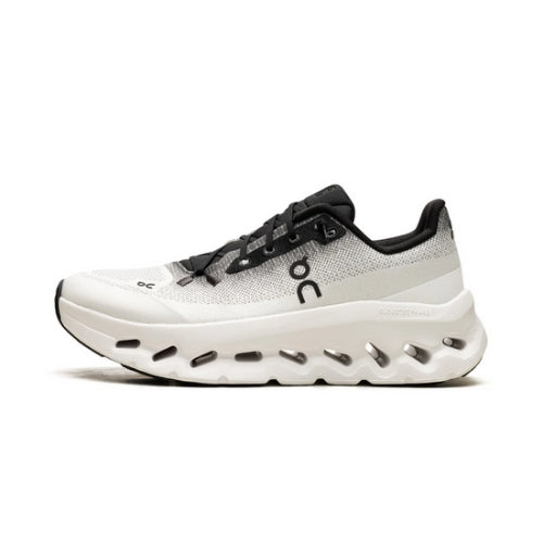 On Running Cloudtilt Black Ivory sneaker with sleek design, adaptive knit upper, and CloudTec® Phase cushioning for stylish all-day comfort