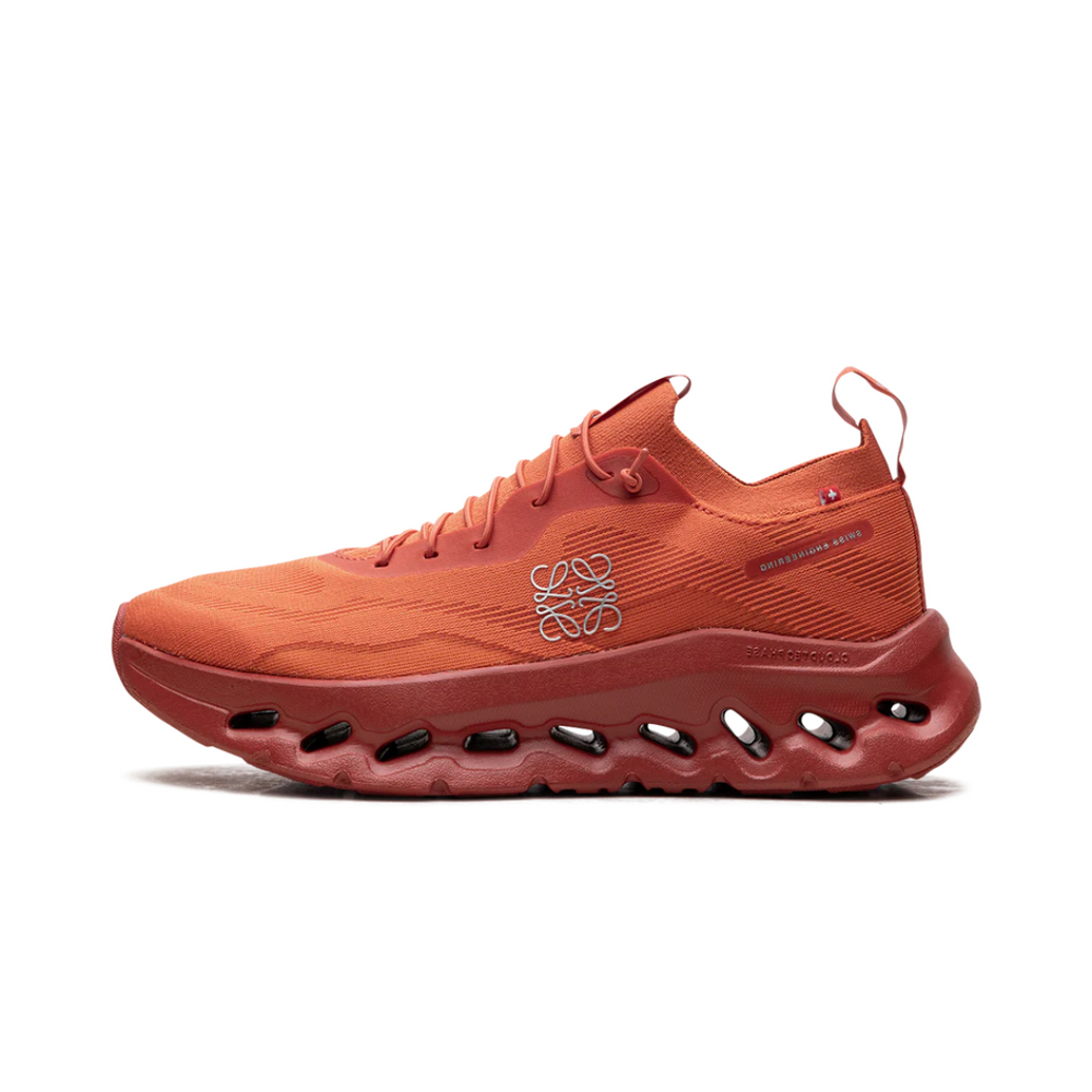 On Running Cloudtilt LOEWE Orange – premium designer running shoe with vibrant orange color, lightweight mesh upper, and CloudTec® cushioning for high-performance comfort and style.
Luxury cult india