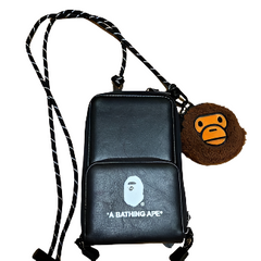 "BAPE KIDS A Bathing Ape Smartphone Shoulder Bag Pouch with Milo Coin Case 2023, featuring a fun design with vibrant colors and the iconic BAPE logo. The pouch is compact and includes an adjustable strap, making it a stylish and practical accessory for kids."