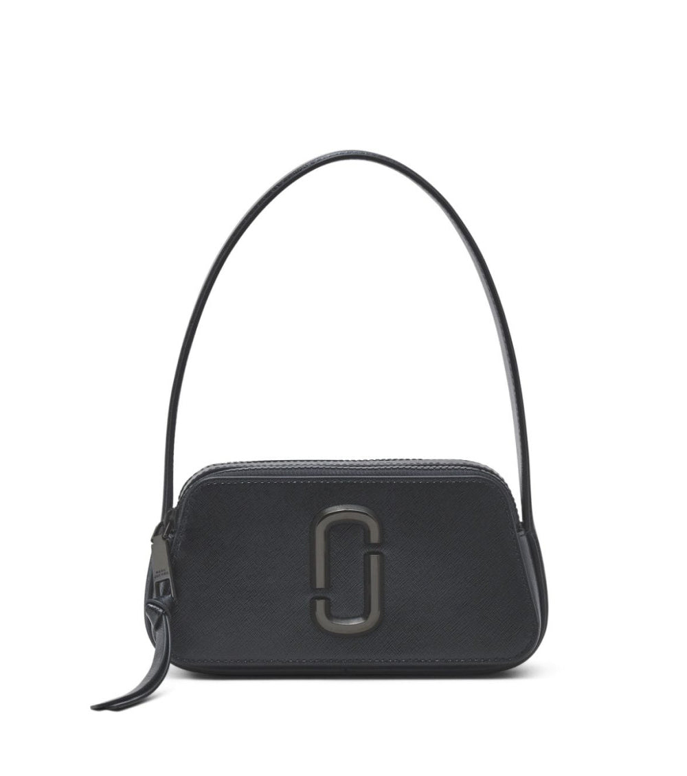 "Marc Jacobs Black The Slingshot Shoulder Bag for women, featuring a classic black design with a unique slingshot silhouette. The bag includes an adjustable strap and a spacious interior, making it a stylish and functional accessory for everyday use."