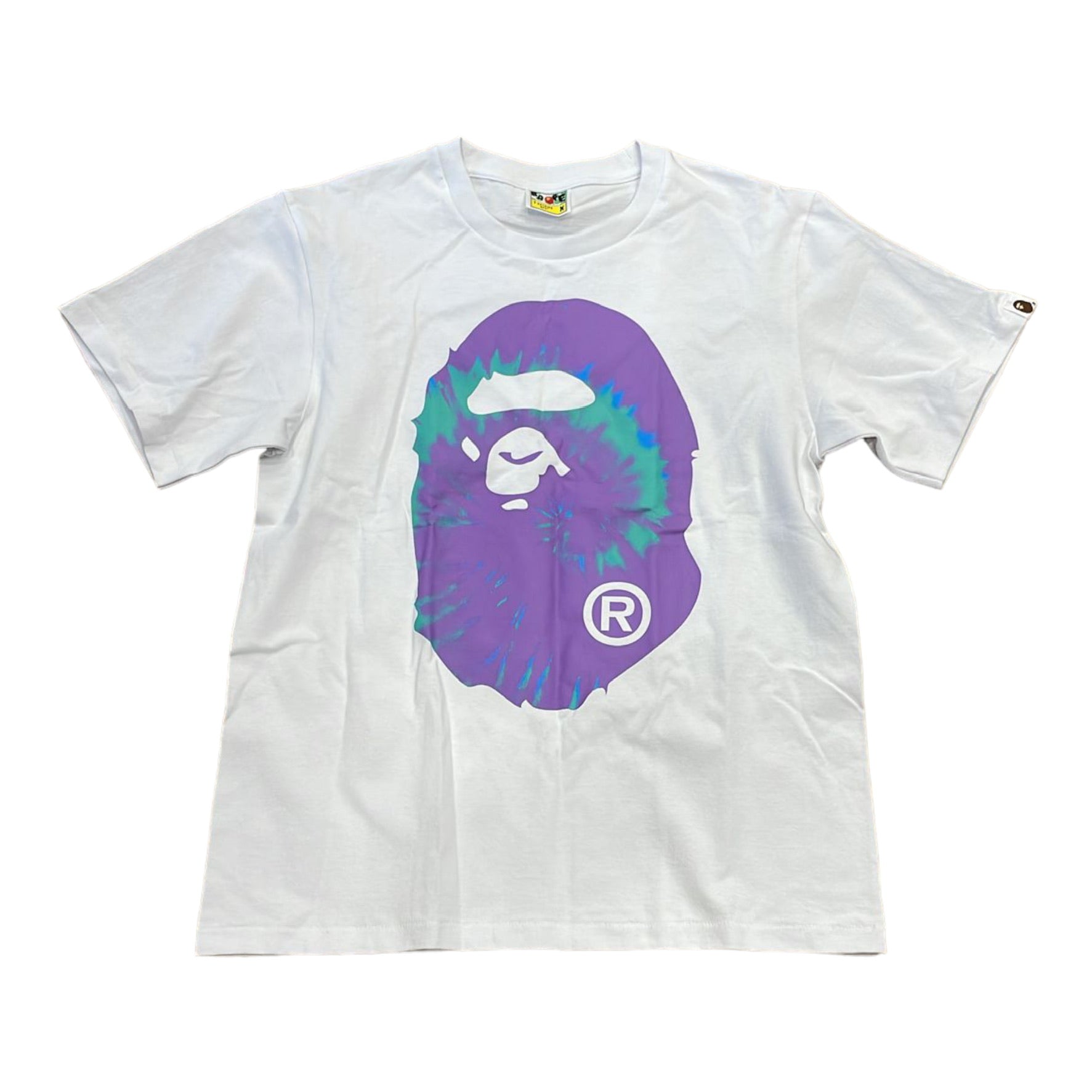 A BATHING APE Tie Dye Bape Head Tee "Tie dye T-shirt featuring the iconic BAPE head graphic, showcasing a colorful and playful design perfect for streetwear enthusiasts."



