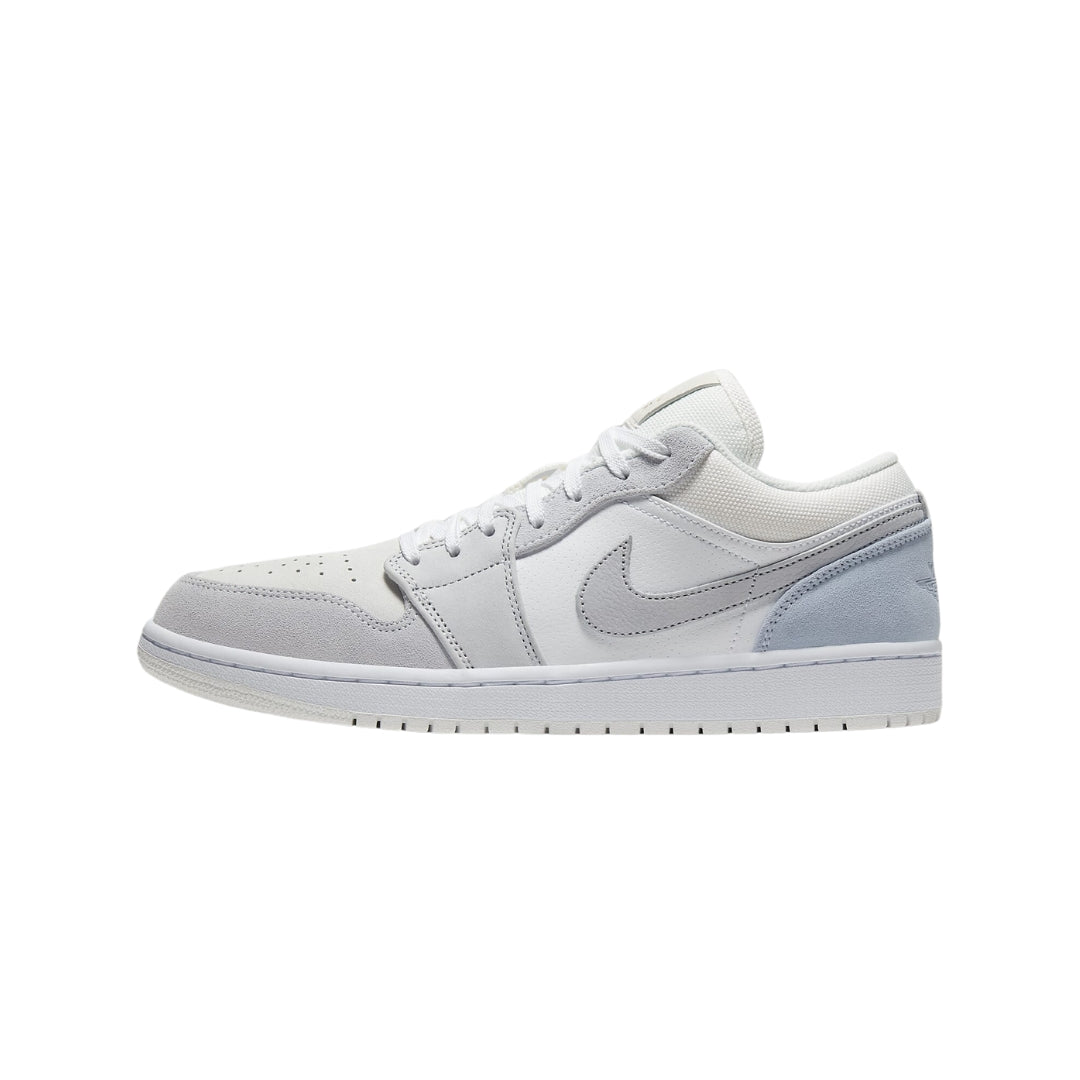 "Nike Air Jordan 1 Low in Football Grey with a Paris-inspired design, showcasing a premium leather upper in shades of grey and white. The shoe features the classic Air Jordan logo and a low-profile silhouette, set on a contrasting rubber sole."