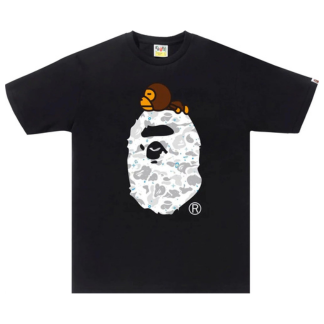 Space Camo Milo On Big Ape Head Black Tee "Black T-shirt featuring a graphic of a large ape head surrounded by space camo patterns and the Milo character, combining playful imagery with urban style."



