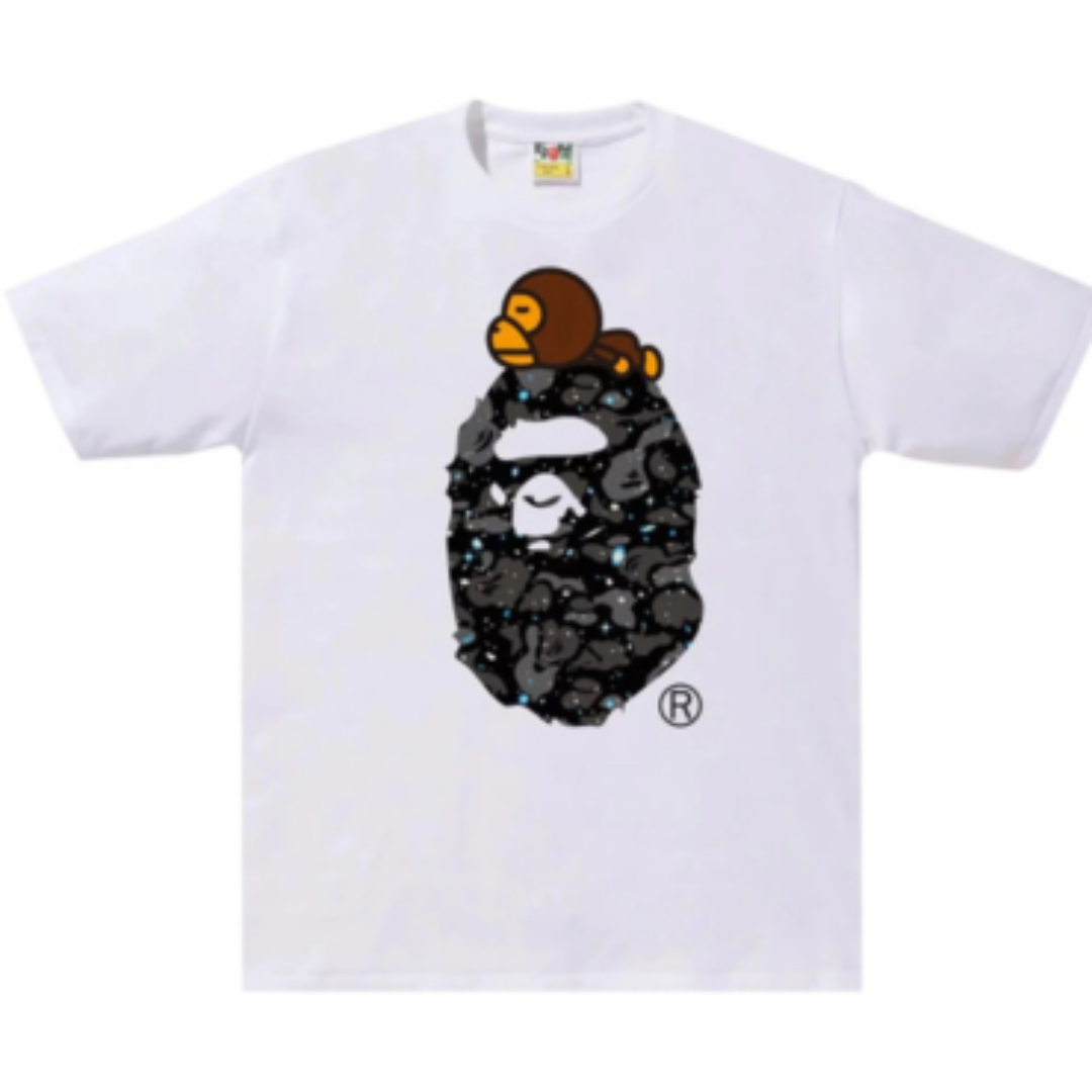 Space Camo Milo On Big Ape Head Tee White "White T-shirt featuring a graphic of a large ape head surrounded by space camo patterns and the Milo character, blending playful design with streetwear style."



