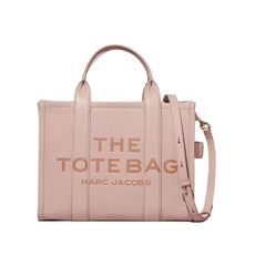 "MARC JACOBS The Medium Tote Bag, featuring a spacious design with sturdy handles and a chic logo. Made from durable materials, this versatile tote is perfect for everyday use, combining style and functionality."



