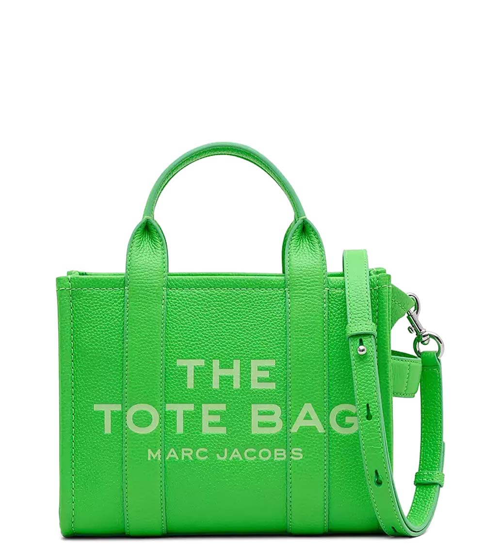 Marc Jacobs Apple The Tote Medium Satchel crafted in leather for women.Dual carry handles with adjustable & removable shoulder strap.


