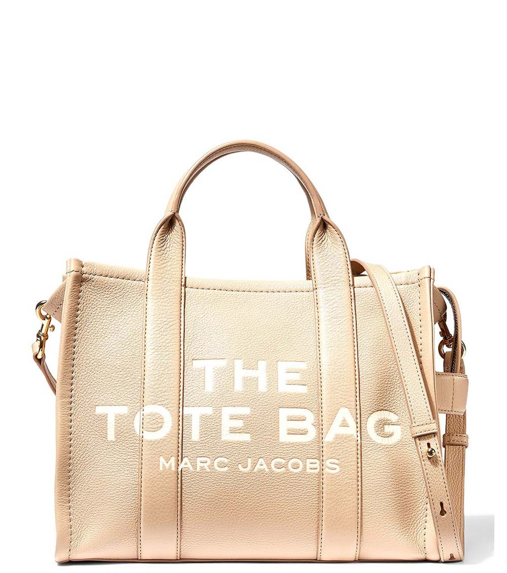 Marc Jacobs Beige The Tote Medium Satchel for women, featuring a neutral beige color and a spacious design. The satchel includes sturdy top handles and a versatile interior, making it a stylish and practical choice for daily use."



