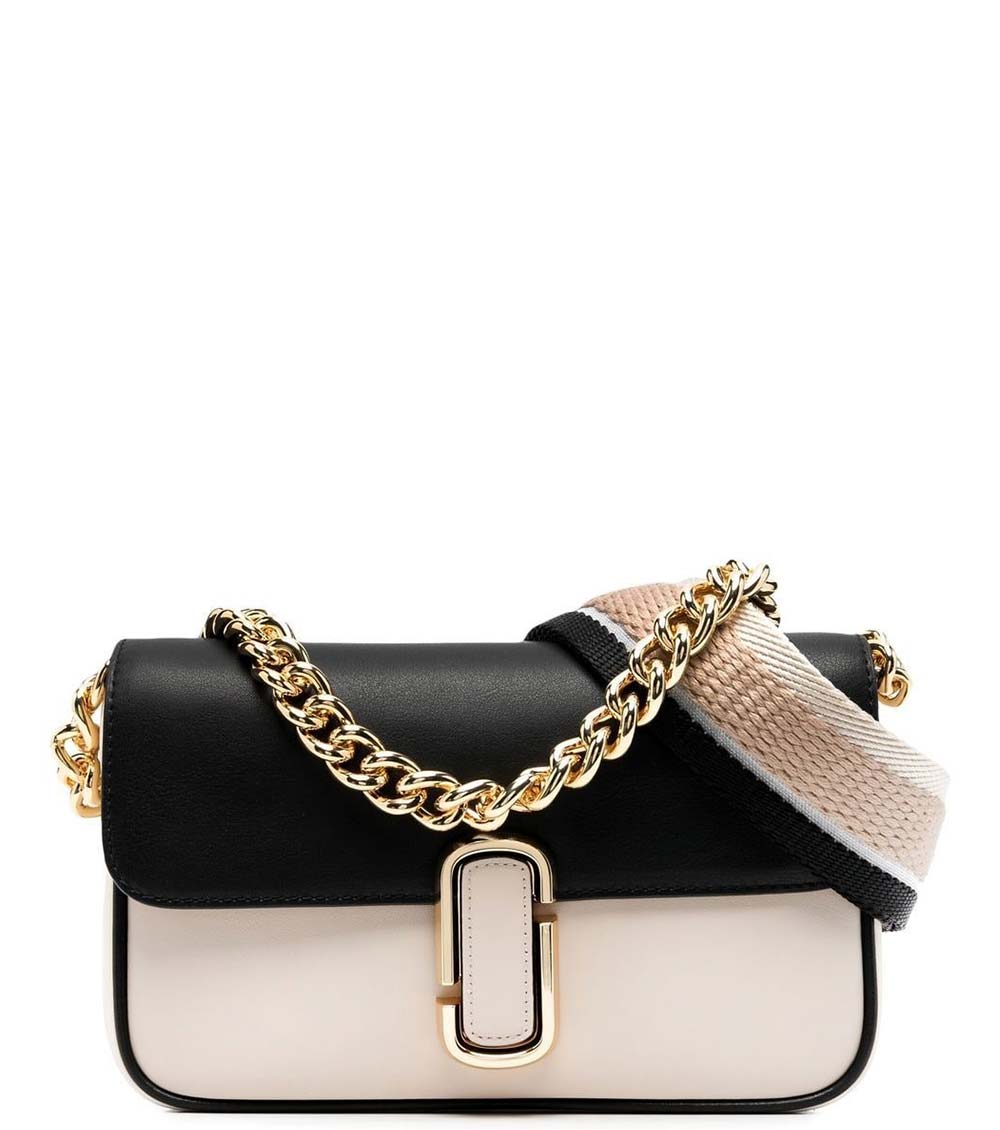 "Marc Jacobs Black/White The J Small Crossbody Bag for women, featuring a striking black and white design with a compact silhouette. The bag includes an adjustable strap and the signature logo, making it a stylish and versatile accessory for daily use."



