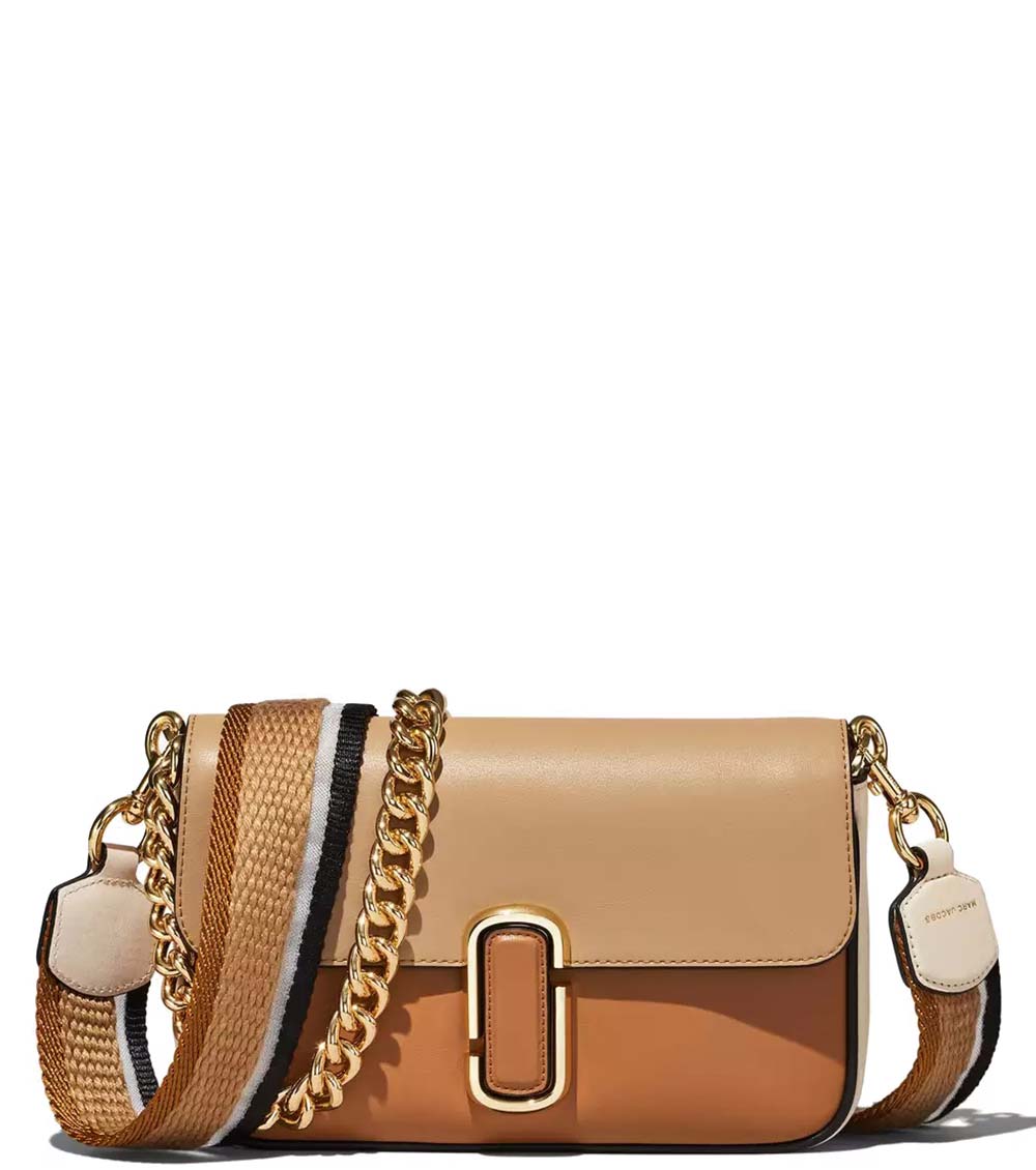  "Marc Jacobs Brown The J Small Crossbody Bag for women, featuring a rich brown color and a compact design. The bag includes an adjustable strap and the signature logo, making it a stylish and versatile accessory for everyday use."



