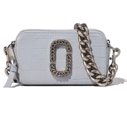 Marc Jacobs Grey Snapshot Mini Crossbody Bag for women, featuring a sleek grey color and a compact design. The bag includes an adjustable strap and the signature logo, making it a stylish and functional accessory for everyday use."



