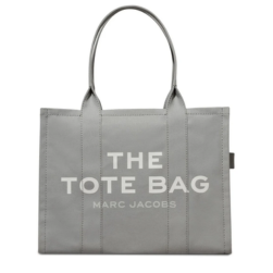 "Marc Jacobs Grey The Large Tote Bag for women, featuring a spacious and versatile design with sturdy handles. Crafted from durable materials, this bag combines a chic aesthetic with practicality, perfect for everyday use."



