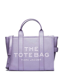 "Marc Jacobs Lavender The Tote Medium Satchel for women, featuring a soft lavender color and a spacious design. The satchel includes sturdy top handles and a versatile interior, making it a stylish and practical accessory for everyday use."



