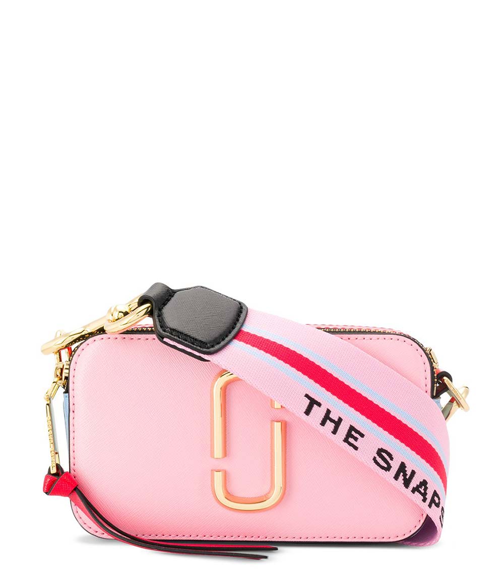 Marc Jacobs Light Pink Snapshot Small Crossbody Bag for women, featuring a soft light pink color and a compact design. The bag includes an adjustable strap and the signature logo, making it a stylish and versatile accessory for everyday outings."



