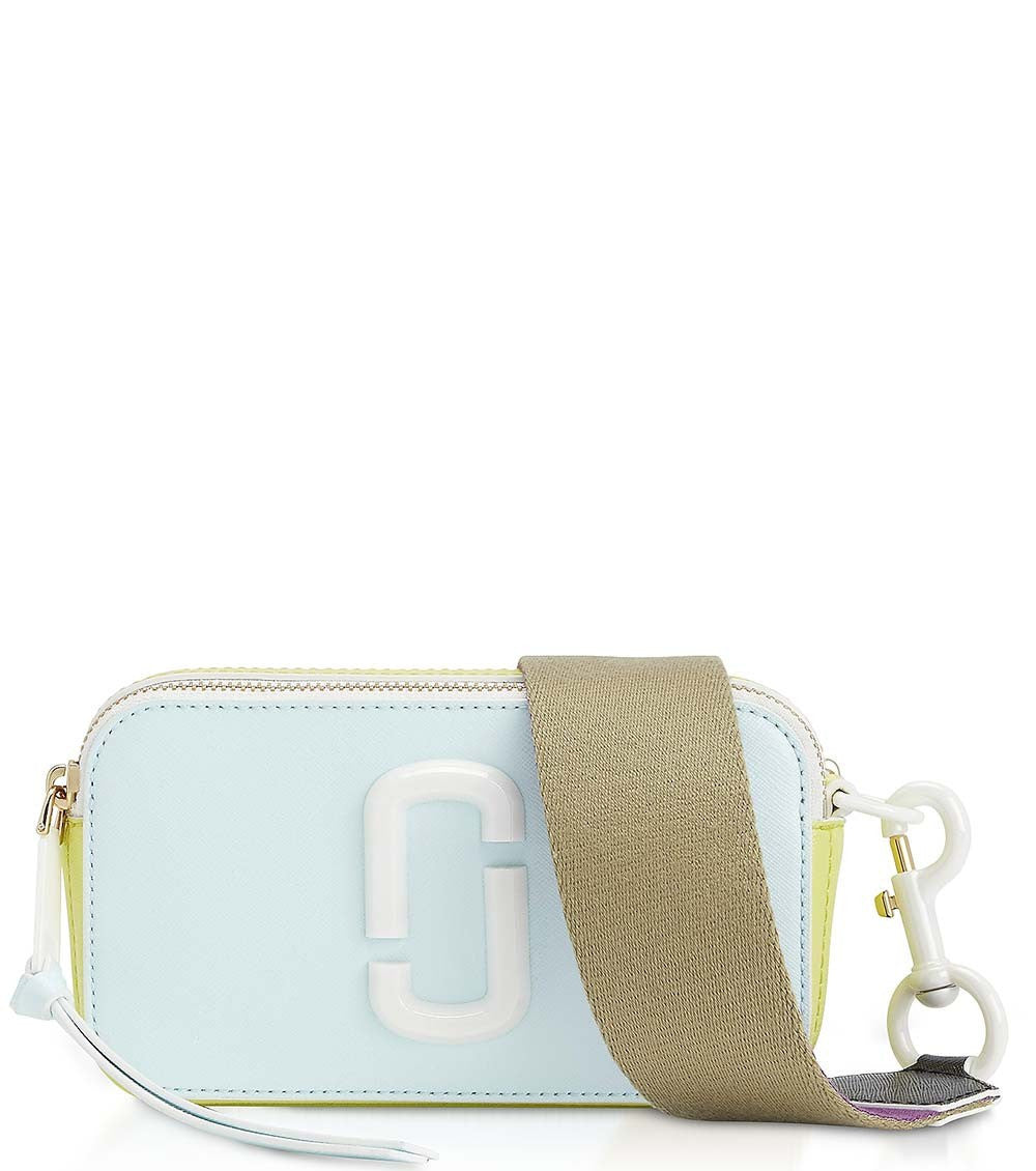 Marc Jacobs Light Blue Snapshot Ceramic Small Crossbody Bag for women, featuring a soft light blue color with a sleek design. The bag includes an adjustable strap and the signature logo, offering a stylish and versatile accessory for daily outings."



