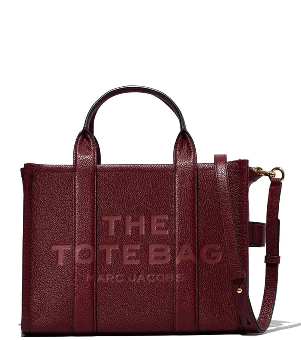 Marc Jacobs Maroon The Tote Medium Satchel for women, featuring a rich maroon color and a spacious design. The satchel includes sturdy top handles and a versatile interior, making it a stylish and practical choice for everyday use."



