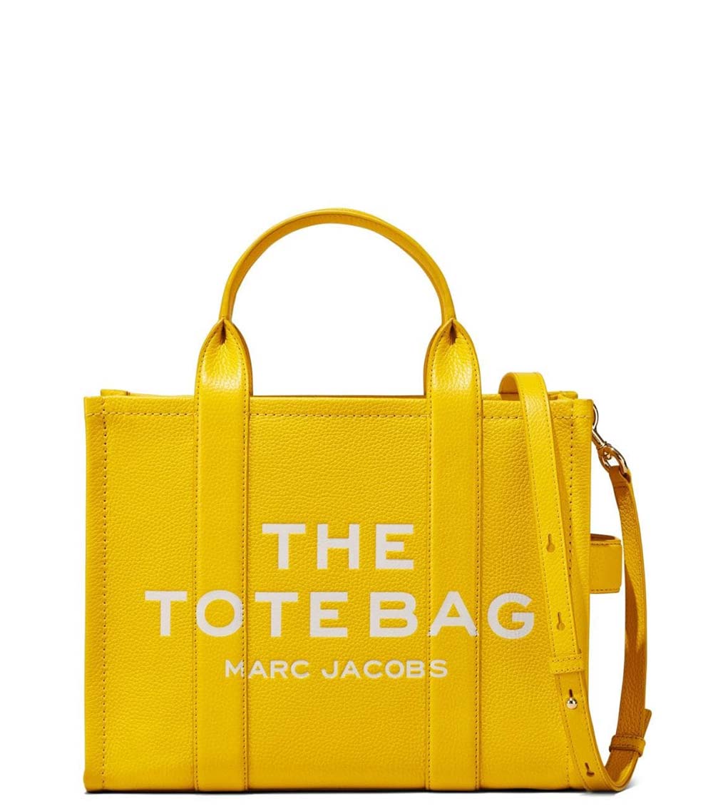 "Marc Jacobs Sun The Tote Medium Satchel for women, featuring a bright sun-yellow color and a spacious design. The satchel includes sturdy top handles and a versatile interior, making it a stylish and practical accessory for everyday use."



