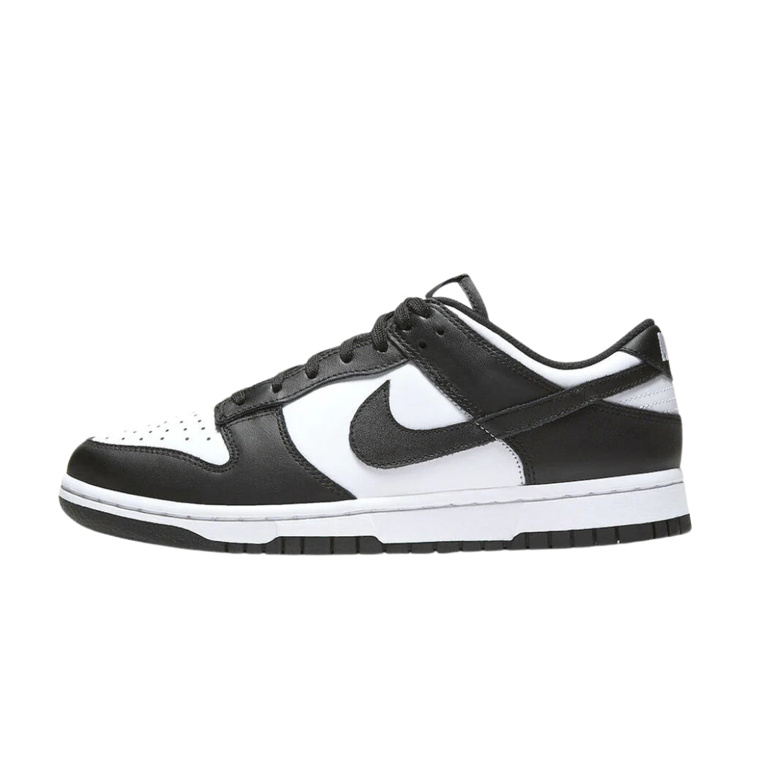 Nike Dunk Low "White Black" (commonly known as "Panda") sneakers featuring a classic black and white color scheme. The shoe has a white leather upper with contrasting black accents on the swoosh and heel, set against a neutral background to highlight its iconic design and stylish appeal.