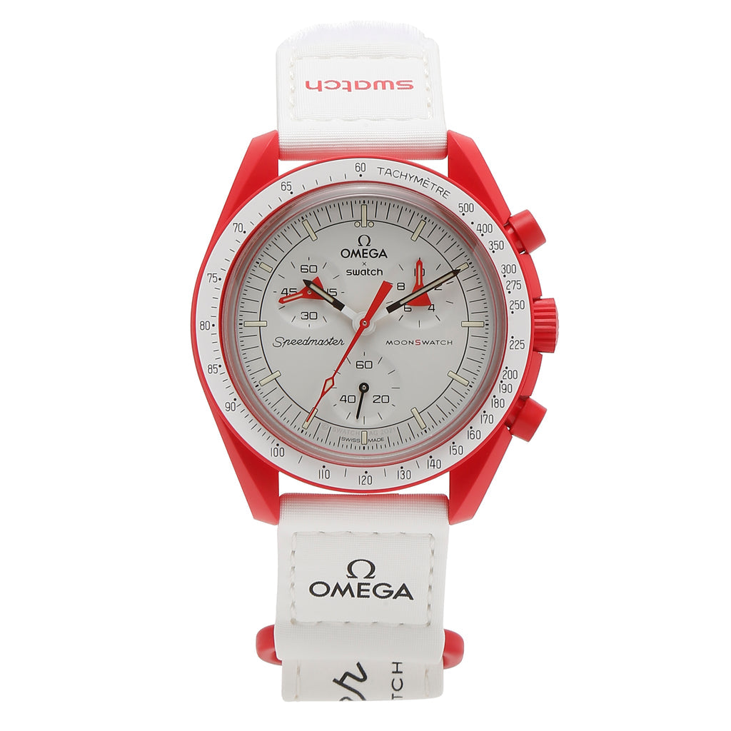 SWATCH X OMEGA BIOCERAMIC MOONSWATCH MISSION TO MARS Fiery red tones juxtapose with the dazzling white dial and VELCRO strap on this ode to Mars. The hours and minutes subdials each have distinctive red hands with a whimsical spaceship design, while the chronograph seconds hand is red.
