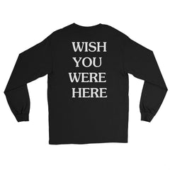 Travis Scott Wish You Were Here (Tee) "T-shirt featuring a graphic from Travis Scott's 'Wish You Were Here' theme, showcasing vibrant imagery and text that reflects his signature style."



