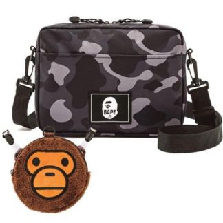  "Bape Black Camo Sling Bag, featuring a sleek black camouflage pattern. The bag includes an adjustable strap and a compact design, making it a stylish and versatile accessory for everyday use.