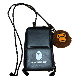  "BAPE KIDS A Bathing Ape Smartphone Shoulder Bag Pouch with Milo Coin Case 2023, featuring a fun design with vibrant colors and the iconic BAPE logo. The pouch is compact and includes an adjustable strap, making it a stylish and practical accessory for kids."



