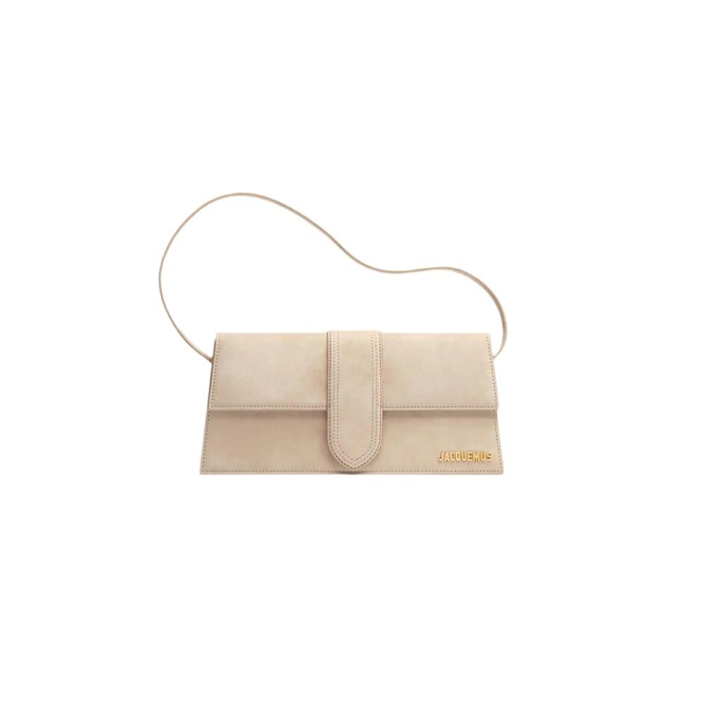 Jacquemus Le Bambino Flap Bag in off-white, showcasing a modern, structured design with a flap closure and a top handle. The handbag is crafted from smooth leather, exuding elegance and versatility, ideal for a chic women's accessory."



