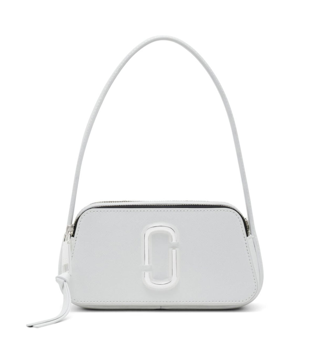  "Marc Jacobs White The Slingshot Shoulder Bag for women, featuring a crisp white design with a unique slingshot silhouette. The bag includes an adjustable strap and a spacious interior, making it a stylish and functional accessory for everyday use."



