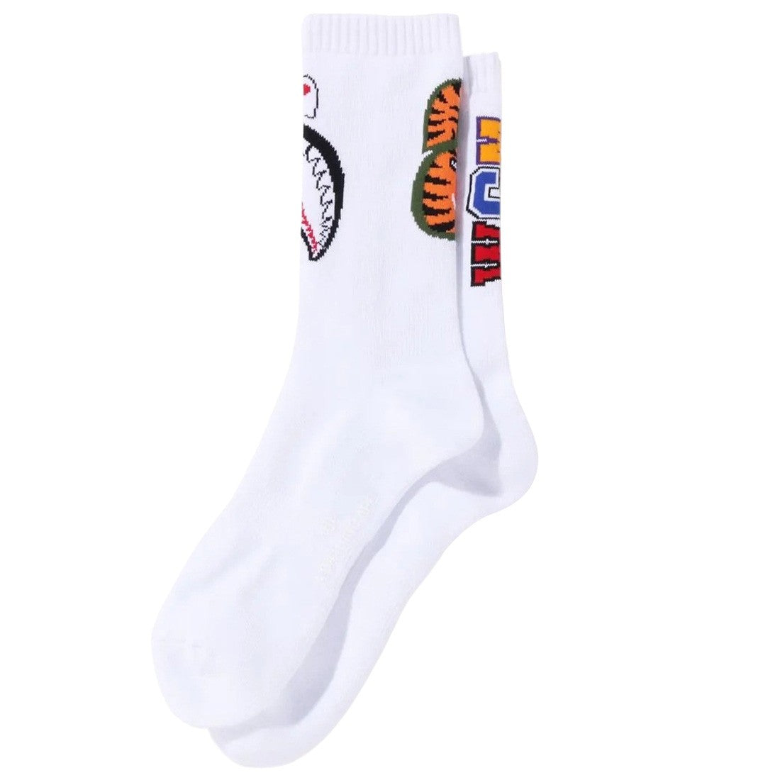 A Bathing Ape Men Shark Socks (white) "White socks featuring a playful shark graphic and the iconic BAPE design, perfect for a bold streetwear look."



