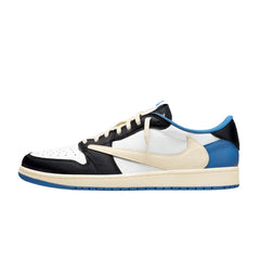 Nike Air Jordan 1 Low "Fragment Design x Travis Scott" sneakers featuring a unique black leather upper with contrasting white and blue accents. The design includes a distinctive backwards swoosh and Fragment Design branding, set against a neutral background to emphasize the collaboration's stylish and modern aesthetic.



